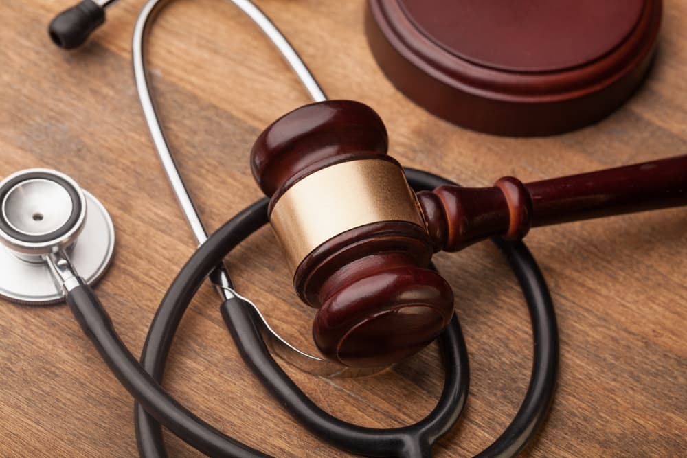 A gavel and stethoscope symbolize the intersection of law and medicine, often representing personal injury law and legal cases involving medical issues.