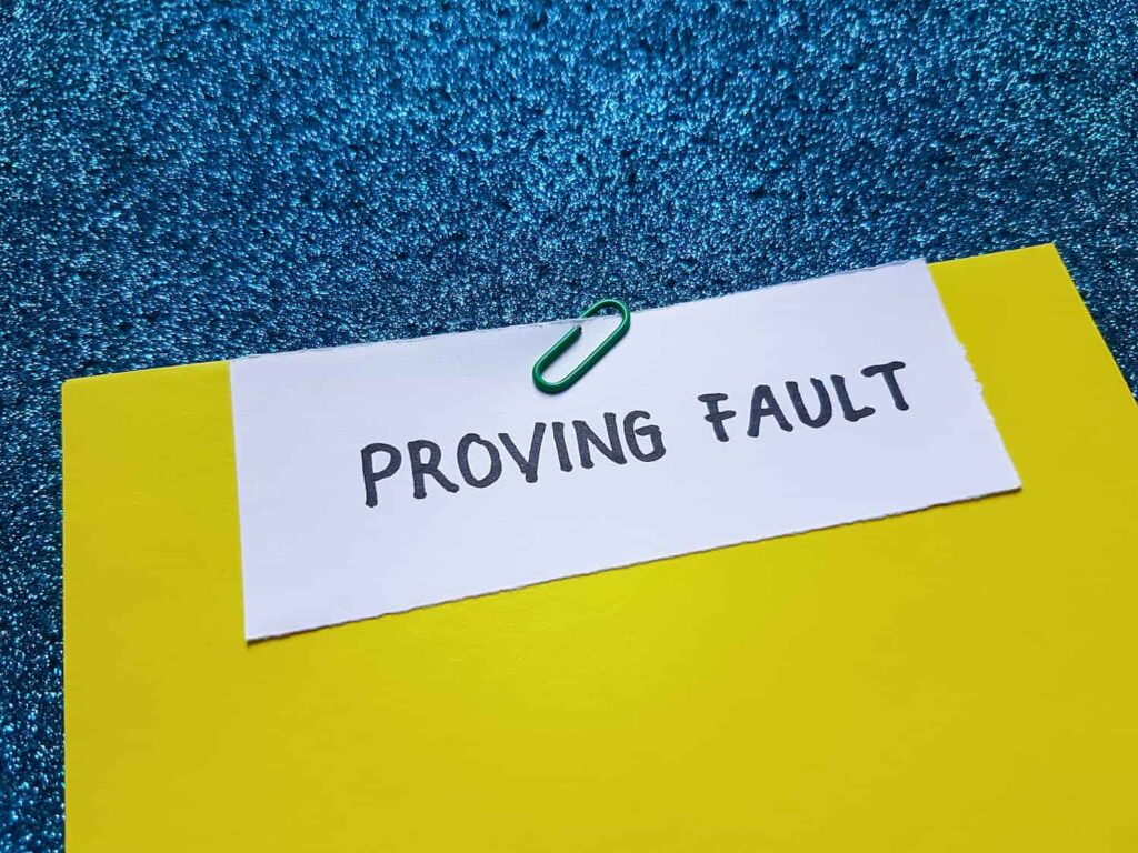 Proving Fault in Motorcycle Accident Cases on Long Island Proving fault concept image for motorcycle accident claims with document and text on legal liability