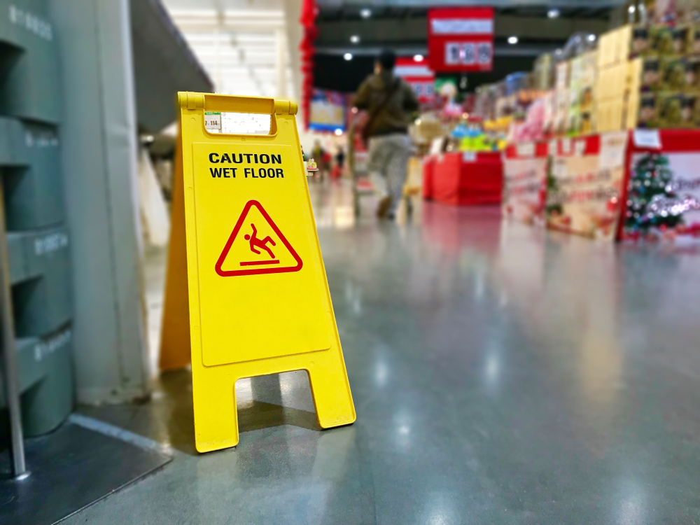 Photo of wet floor sign in a supermarket